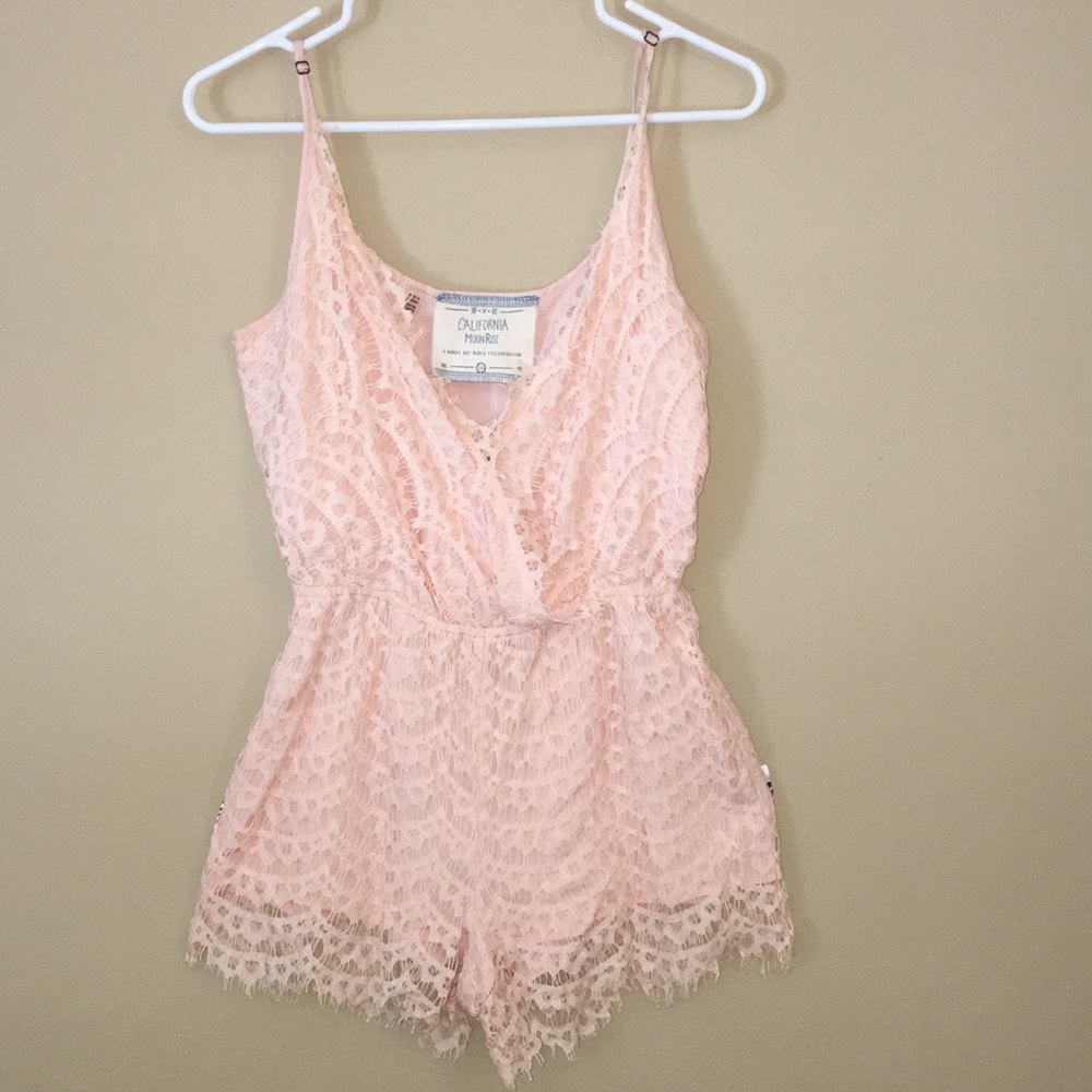 a pink lace romper